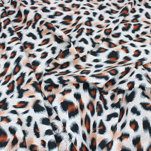 3 Metres Peach Skin Animal Print - 55" Wide - Orange & White Leopard